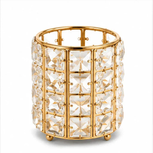Crystal makeup brush holder with gold frame on white background