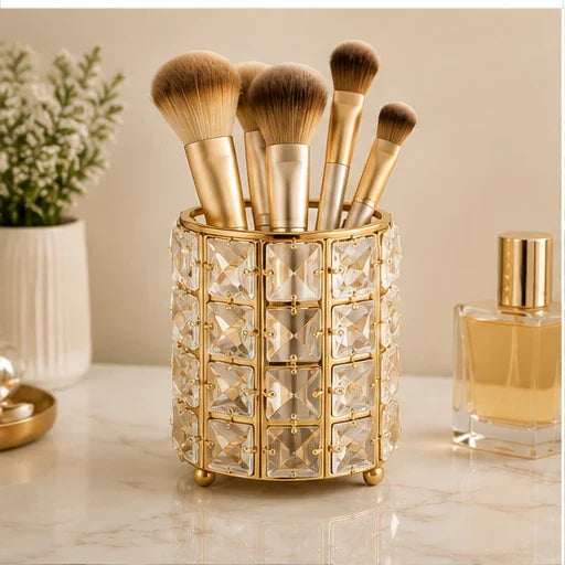 Crystal makeup brush holder styled on a vanity with makeup brushes