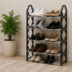 Five-tier black and silver shoe rack with shoes in a home entryway