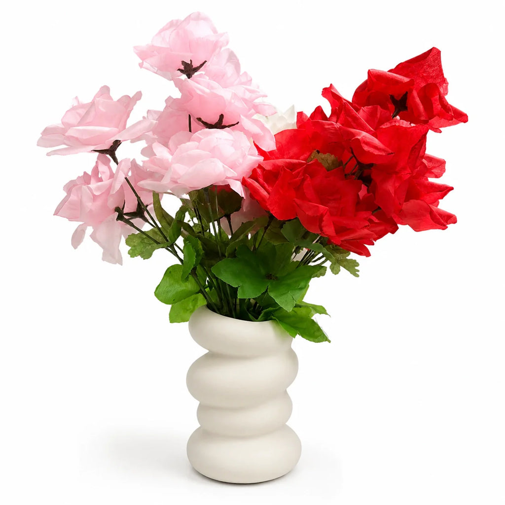 White Wavy Ceramic-Style Vase with flower styling inspiration